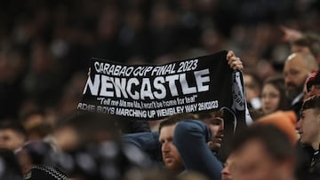 Soccer Football - Carabao Cup - Semi Final - Second Leg - Newcastle United v Southampton - St James' Park, Newcastle, Britain - January 31, 2023 Newcastle United fan holds a scarf Action Images via Reuters/Lee Smith EDITORIAL USE ONLY. No use with unauthorized audio, video, data, fixture lists, club/league logos or 'live' services. Online in-match use limited to 75 images, no video emulation. No use in betting, games or single club /league/player publications. Please contact your account representative for further details.