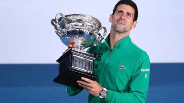 MELBOURNE, AUSTRALIA - FEBRUARY 02: Novak Djokovic of Serbia poses with the Norman Brookes Challenge Cup after winning the Men's Singles Final against Dominic Thiem of Austria on day fourteen of the 2020 Australian Open at Melbourne Park on February 02, 2
