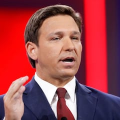 How will Florida Governor Ron DeSantis punish cities for vaccine mandates?