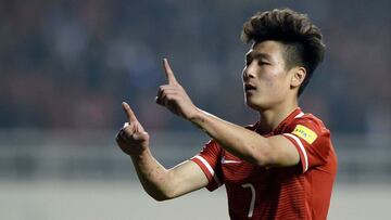 Wu Lei of China celebrates after scoring a goal during the 2018 World Cup football qualifying match against Qatar in Xi&#039;an, northwest China&#039;s Shanxi province on March 29, 2016.   CHINA OUT / AFP PHOTO / STR