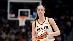 SEATTLE, WASHINGTON - JUNE 27: Caitlin Clark #22 of the Indiana Fever looks on during the first quarter against the Seattle Storm at Climate Pledge Arena on June 27, 2024 in Seattle, Washington. NOTE TO USER: User expressly acknowledges and agrees that, by downloading and or using this photograph, User is consenting to the terms and conditions of the Getty Images License Agreement.   Steph Chambers/Getty Images/AFP (Photo by Steph Chambers / GETTY IMAGES NORTH AMERICA / Getty Images via AFP)