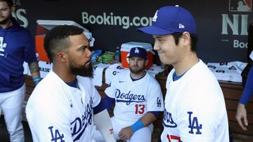 Oct 11, 2024; Los Angeles, California, USA; Los Angeles Dodgers designated hitter Shohei Ohtani (17) and outfielder Teoscar Hernandez (37) react in the dugout before game five against the San Diego Padres in the NLDS for the 2024 MLB Playoffs at Dodger Stadium. Mandatory Credit: Kiyoshi Mio-Imagn Images