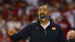 Juwan Howard throws punch at Wisconsin assistant