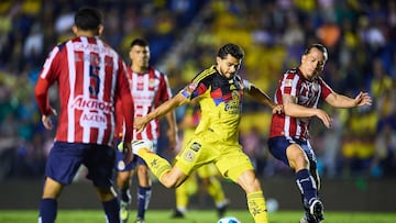 Henry Martin (L) of America fights for the ball with Fernando Gonzalez (R) of Guadalajara during the 8th round match between America and Guadalajara as part of the Liga BBVA MX, Torneo Apertura 2025 at Ciudad de los Deportes Stadium, on September 13, 2025 in Mexico City, Mexico.