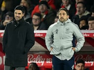 Arsenal's Spanish manager Mikel Arteta (L) and Arsenal's French technical coach Nicolas Jover watch the players from the touchline during the English Premier League football match between Nottingham Forest and Arsenal at The City Ground in Nottingham, central England, on January 17, 2026. (Photo by JUSTIN TALLIS / AFP) / RESTRICTED TO EDITORIAL USE. No use with unauthorized audio, video, data, fixture lists, club/league logos or 'live' services. Online in-match use limited to 120 images. An additional 40 images may be used in extra time. No video emulation. Social media in-match use limited to 120 images. An additional 40 images may be used in extra time. No use in betting publications, games or single club/league/player publications. /