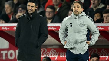 Arsenal's Spanish manager Mikel Arteta (L) and Arsenal's French technical coach Nicolas Jover watch the players from the touchline during the English Premier League football match between Nottingham Forest and Arsenal at The City Ground in Nottingham, central England, on January 17, 2026. (Photo by JUSTIN TALLIS / AFP) / RESTRICTED TO EDITORIAL USE. No use with unauthorized audio, video, data, fixture lists, club/league logos or 'live' services. Online in-match use limited to 120 images. An additional 40 images may be used in extra time. No video emulation. Social media in-match use limited to 120 images. An additional 40 images may be used in extra time. No use in betting publications, games or single club/league/player publications. /