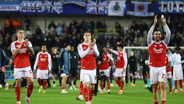Soccer Football - UEFA Champions League - Club Brugge v Arsenal - Jan Breydel Stadium, Bruges, Belgium - December 10, 2025 Arsenal's Riccardo Calafiori, Arsenal's Viktor Gyokeres and Arsenal's Mikel Merino celebrate after the match REUTERS/Yves Herman