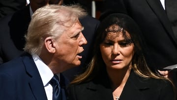 U.S President Donald Trump and first lady Melania Trump attend the funeral Mass of Pope Francis in St. Peter's Square at the Vatican, April 26, 2025. REUTERS/Dylan Martinez TPX IMAGES OF THE DAY