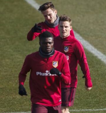 Saúl, Thomas y Gameiro.
