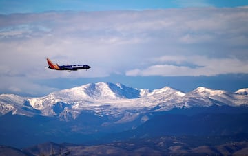 A Southwest jet makes its final approach to the Denver International Airport outside Denver, Colorado.