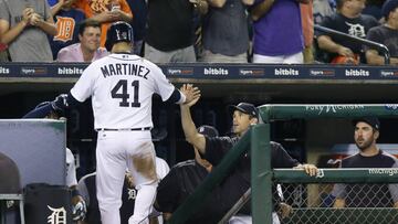 DETROIT, MI - JULY 5: Victor Martinez #41 of the Detroit Tigers receives a high-five from manager Brad Ausmus #7 of the Detroit Tigers after scoring against the San Francisco Giants on a single by Ian Kinsler #3 of the Detroit Tigers during the seventh inning at Comerica Park on July 5, 2017 in Detroit, Michigan.   Duane Burleson/Getty Images/AFP
 == FOR NEWSPAPERS, INTERNET, TELCOS &amp; TELEVISION USE ONLY ==