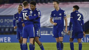 Leicester City's players celebrate following the English Premier League soccer match between Leicester City and Chelsea at the King Power Stadium in Leicester, England, Tuesday, Jan. 19, 2021. Leicester City won the match 2-0. (AP Photo/Rui Vieira, P