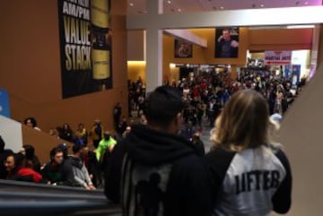 Two people look on at the convention.