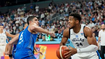 Basketball - FIBA EuroBasket 2025 - Round of 16 - Greece v Israel - Xiaomi Arena, Riga, Latvia - September 7, 2025 Israel's Itay Segev in action with Greece's Giannis Antetokounmpo REUTERS/Ints Kalnins