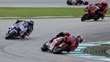 MotoGP - Malaysian Grand Prix - Sepang International Circuit, Sepang, Malaysia - November 12, 2023 Ducati Lenovo Team's Enea Bastianini and Gresini Racing MotoGP's Alex Marquez in action during the race REUTERS/Hasnoor Hussain