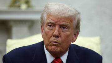 U.S. President Donald Trump reacts as he meets NATO Secretary General Mark Rutte (not pictured), in the Oval Office at the White House in Washington, D.C., U.S., March 13, 2025. REUTERS/Evelyn Hockstein