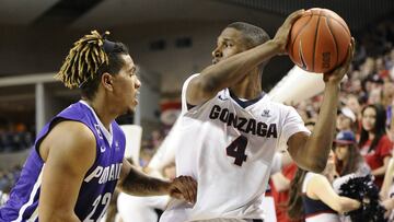 Jan 21, 2017; Spokane, WA, USA; Gonzaga Bulldogs guard Jordan Mathews (4) goes up against Portland Pilots guard Jazz Johnson (22) during the second half at McCarthey Athletic Center. The Bulldogs won 73-52. Mandatory Credit: James Snook-USA TODAY Sports
