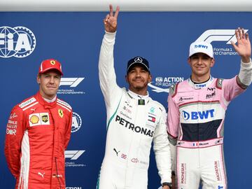 Lewis Hamilton, Sebastian Vettel y Esteban Ocon en el podio del GP de Bélgica. 