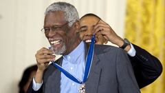 (FILES) In this file photo taken on February 14, 2011, US President Barack Obama awards the 2010 Medal of Freedom to NBA basketball hall of famer and human rights advocate Bill Russell during a ceremony at the White House in Washington, DC. - NBA great Bill Russell, the cornerstone of a Boston Celtics dynasty that won 11 titles and a powerful voice for social justice, has died at the age of 88, a statement posted on social media said July 31, 2022. (Photo by Jim WATSON / AFP)