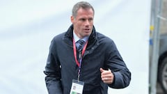 Liverpool great Carragher apologises for spitting at Man United fan