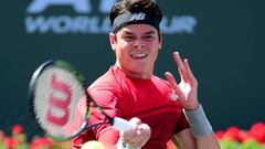 Milos Raonic of Canada hits a forehand as he beats David Goffin of Belgium during day thirteen of the 2016 BNP Parisbas Open at Indian Wells.