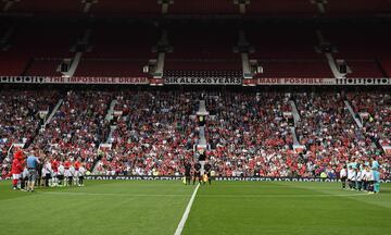 Manchester United and Barcelona players and officials observe a minute silence for the recent terror attacks in Barcelona and Manchester ahead of today's Legends charity match at Old Trafford.