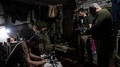 VELYKA NOVOSILKA, DONBAS REGION, UKRAINE, MARCH 6: Ukranian servicemen of the Ukranian Volunteer Army prepare their weapons at the basement of the base camp, at an undisclosed location next to the Vuhledar frontline, Ukraine, March 7 2023. The frontline around the city of Vuhledar, a strategic rail and road hub south of Bakhmut, resembles an apocalyptic scenario. Destroyed buildings and burned cars are scattered at both sides of the road. There, hidden on basements of abandoned houses, Ukrainian serviceman of the Ukrainian Volunteer Army hold their positions against relentless attacks by Russian forces. Under the threat of the enemyâs artillery, that echoes through the village, soldiers hold their fortified positions in shifts of 12h. In recent days, they said, they have been able to repel several Russian offensives. (Photo by Ignacio Marin/Anadolu Agency via Getty Images)