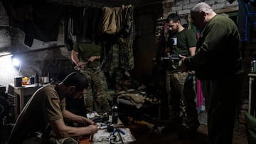 VELYKA NOVOSILKA, DONBAS REGION, UKRAINE, MARCH 6: Ukranian servicemen of the Ukranian Volunteer Army prepare their weapons at the basement of the base camp, at an undisclosed location next to the Vuhledar frontline, Ukraine, March 7 2023. The frontline around the city of Vuhledar, a strategic rail and road hub south of Bakhmut, resembles an apocalyptic scenario. Destroyed buildings and burned cars are scattered at both sides of the road. There, hidden on basements of abandoned houses, Ukrainian serviceman of the Ukrainian Volunteer Army hold their positions against relentless attacks by Russian forces. Under the threat of the enemyâs artillery, that echoes through the village, soldiers hold their fortified positions in shifts of 12h. In recent days, they said, they have been able to repel several Russian offensives. (Photo by Ignacio Marin/Anadolu Agency via Getty Images)