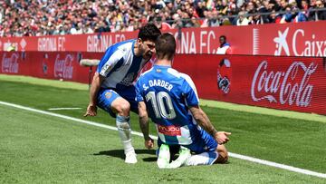 GIRONA, SPAIN - APRIL 06: Sergi Darder Moll of RCD Espanyol celebrates after scoring his team&#039;s first goal with his team mates during the La Liga match between Girona FC and RCD Espanyol at Montilivi Stadium on April 06, 2019 in Girona, Spain. (Photo