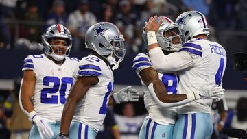 ARLINGTON, TEXAS - DECEMBER 04: CeeDee Lamb #88 of the Dallas Cowboys celebrates a touchdown with Dak Prescott #4 of the Dallas Cowboys in the first quarter of a game against the Indianapolis Colts at AT&T Stadium on December 04, 2022 in Arlington, Texas.   Richard Rodriguez/Getty Images/AFP (Photo by Richard Rodriguez / GETTY IMAGES NORTH AMERICA / Getty Images via AFP)