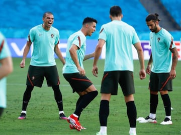 Kepler Laveran "Pepe" Lima and Cristiano Ronaldo in action during the official training of Portugal at the La Cartuja stadium on June 26, 2021 in Sevilla, Spain.