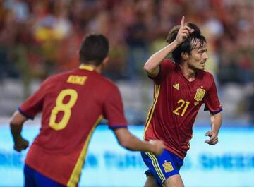 Silva (right) celebrates putting Spain in front.