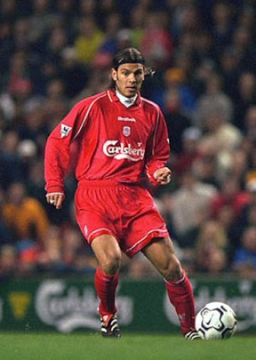 Patrik Berger is remembered fondly by Liverpool fans in particular for a long pass assist to Michael Owen to "steal" the 2001 FA Cup from the hands of Arsenal. He'll be treated to a pint of Guinness anytime he's near Anfield and he is awarded a central mi