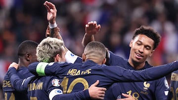 France's forward #10 Kylian Mbappe celebrates with teammates after scoring the eleventh goal during the UEFA EURO 2024 Group B qualifying football match between France and Gibraltar at the Allianz Riviera stadium in Nice, southeastern France, on November 18, 2023. (Photo by FRANCK FIFE / AFP)