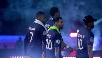 (From L) Paris Saint-Germain's French forward Kylian Mbappe, Paris Saint-Germain's Argentine forward Lionel Messi and Paris Saint-Germain's Brazilian forward Neymar leave after celebrating team's French L1 2022-2023 championship following the L1 football match between Paris Saint-Germain (PSG) and Clermont Foot 63 at the Parc des Princes Stadium in Paris on June 3, 2023. (Photo by Alain JOCARD / POOL / AFP)