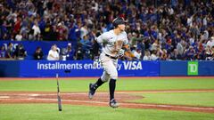 TORONTO, ON - SEPTEMBER 28: Aaron Judge #99 of the New York Yankees hits his 61st home run of the season in the seventh inning against the Toronto Blue Jays at Rogers Centre on September 28, 2022 in Toronto, Ontario, Canada. Judge has now tied Roger Maris for the American League record.   Vaughn Ridley/Getty Images/AFP