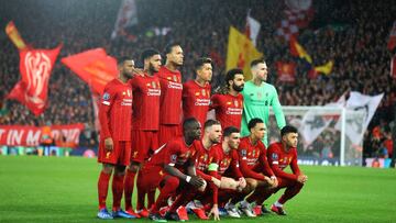 LIVERPOOL, ENGLAND - MARCH 11:  The Liverpool team line up before the UEFA Champions League round of 16 second leg match between Liverpool FC and Atletico Madrid at Anfield