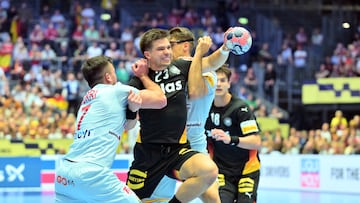 19 January 2026, Denmark, Herning: Handball: European Championship, Germany - Spain, preliminary round, Group A, match day 3, Jyske Bank Boxing. Renars Uscins (M, Germany) against Jan Gurri Aregay (l, Spain). Photo: Sina Schuldt/dpa (Photo by Sina Schuldt/picture alliance via Getty Images)