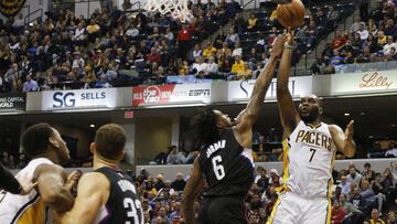 Nov 27, 2016; Indianapolis, IN, USA; Indiana Pacers center Al Jefferson (7) takes a shot against Los Angeles Clippers center DeAndre Jordan (6) at Bankers Life Fieldhouse. Indiana Pacers defeat the Los Angeles Clippers 91-70. Mandatory Credit: Brian Spurlock-USA TODAY Sports