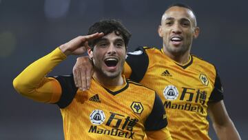Wolverhampton Wanderers' Pedro Neto celebrates after scoring his team's first goal during the English Premier League soccer match between Arsenal and Wolverhampton Wanderers at Emirates Stadium, London, Sunday, Nov. 29, 2020. (Julian Finney/Pool