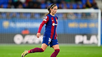 Barcelona's Spanish midfielder #14 Aitana Bonmati runs with the ball during the UEFA Women's Champions League quarter-final, second leg football match between FC Barcelona and SK Brann Kvinner at the Johan Cruyff stadium in Sant Joan Despi, near Barcelona, on March 28, 2024. (Photo by PAU BARRENA / AFP)