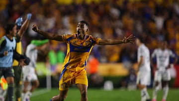 Tigres' Brazilian defender #02 Joaquim Henrique celebrates after an own goal by Necaxa's defender #05 Alejandro Mayorga (out of frame) during the Liga MX Clausura tournament quarter-final second leg football match between Tigres and Necaxa at the UANL University Stadium in San Nicol�s de los Garza, Nuevo Leon state, Mexico on May 11, 2025. (Photo by Julio Cesar AGUILAR / AFP)