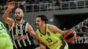 Thomas Heurtel trata de superar a Nick Calathes.