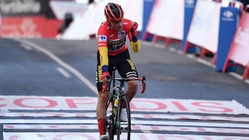 Team Jumbo rider Slovenia&#039;s Primoz Roglic reacts at the end of the 17th stage of the 2020 La Vuelta cycling tour of Spain, a 178,2-km race from Sequeros to Alto de La Covatilla, on November 7, 2020. - Roglic is set to win the Vuelta with one stage left. (Photo by OSCAR DEL POZO / AFP)