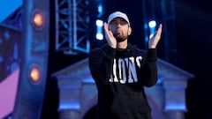 DETROIT, MICHIGAN - APRIL 25: Rapper Marshall "Eminem" Mathers claps during the first round of the 2024 NFL Draft at Campus Martius Park and Hart Plaza on April 25, 2024 in Detroit, Michigan.