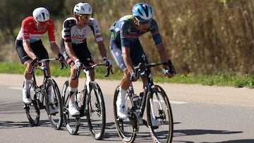 UAE Team Emirates - XRG's Spanish rider Igor Arrieta, flanked by Tudor Pro Cycling Team's Luxembourgish rider Arthur Kluckers (L) and Soudal Quick-Step's Belgian rider Steff Cras (R), rides in a breakaway during the 6th stage of the Paris-Nice cycling race, 179.3 km between Barbentane and Apt, on March 13, 2026. (Photo by Anne-Christine POUJOULAT / AFP)