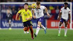CARSON, CA - JANUARY 28: Julian Gressel #2 of the United States heads the ball away from Daniel Ruiz #11 of Colombia during a game between Colombia and USMNT at Dignity Health Sports Park on January 28, 2023 in Carson, California. (Photo by Jenny Chuang/ISI Photos/Getty Images)