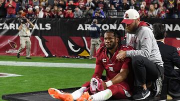 GLENDALE, ARIZONA - DECEMBER 12: Kyler Murray #1 of the Arizona Cardinals is carted off the field after being injured against the New England Patriots during the first quarter of the game at State Farm Stadium on December 12, 2022 in Glendale, Arizona.   Norm Hall/Getty Images/AFP (Photo by Norm Hall / GETTY IMAGES NORTH AMERICA / Getty Images via AFP)