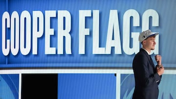 US basketball player Cooper Flagg steps on stage after being selected first overall by the Dallas Mavericks during the opening round of the 2025 NBA Draft at Barclays Center in Brooklyn, New York, on June 25, 2025. Versatile US college teen star Cooper Flagg was selected first overall in the NBA draft on June 25 by the Dallas Mavericks, where he'll join a star-laden team already touted as a playoff threat next season.
Flagg, a consensus pick as the top US college player as a freshman at Duke University last season, is the second-youngest player taken first overall. (Photo by TIMOTHY A. CLARY / AFP)