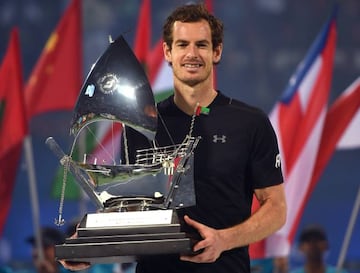 Waiting in Indian Wells | Andy Murray poses with the trophy after winning the ATP Dubai Championship.